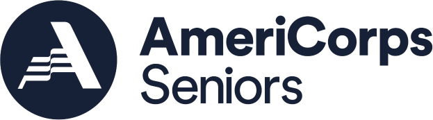 Logo der American Corps of Seniors mit "American Corps" in fetter schwarzer Schrift über "Seniors" in kleinerer Schrift auf einem weißen Hintergrund.