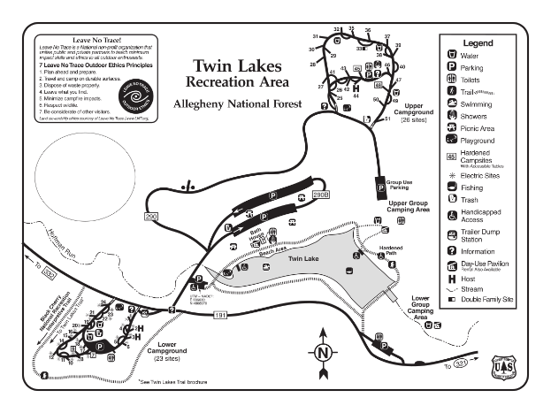 Eine detaillierte Karte des Twin Lakes Freizeitgebiets, die Wanderwege, Pfade und Sehenswürdigkeiten mit begleitendem Text und Symbolen zeigt.